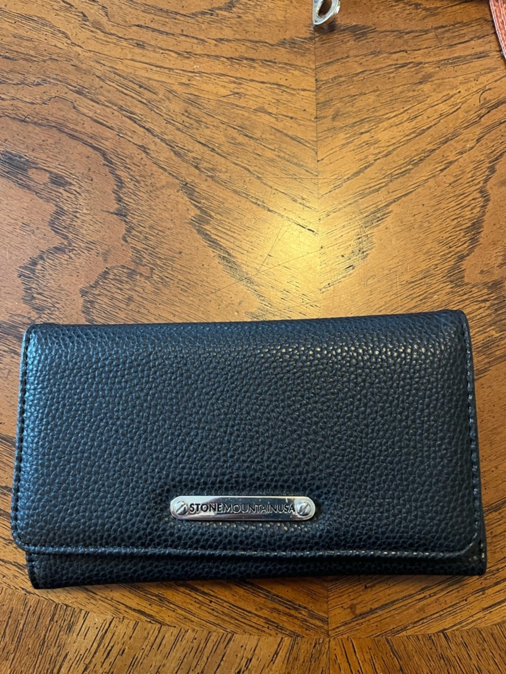 Stone Mountain Accessories Black Pebbled Leather Wallet with Gold Logo Accent